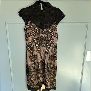 Black and cream lace dress